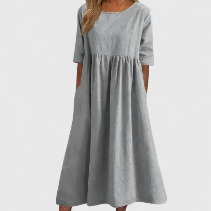 Round Neck Half Sleeve Textured Pleated Pocket A-Line Midi Dress