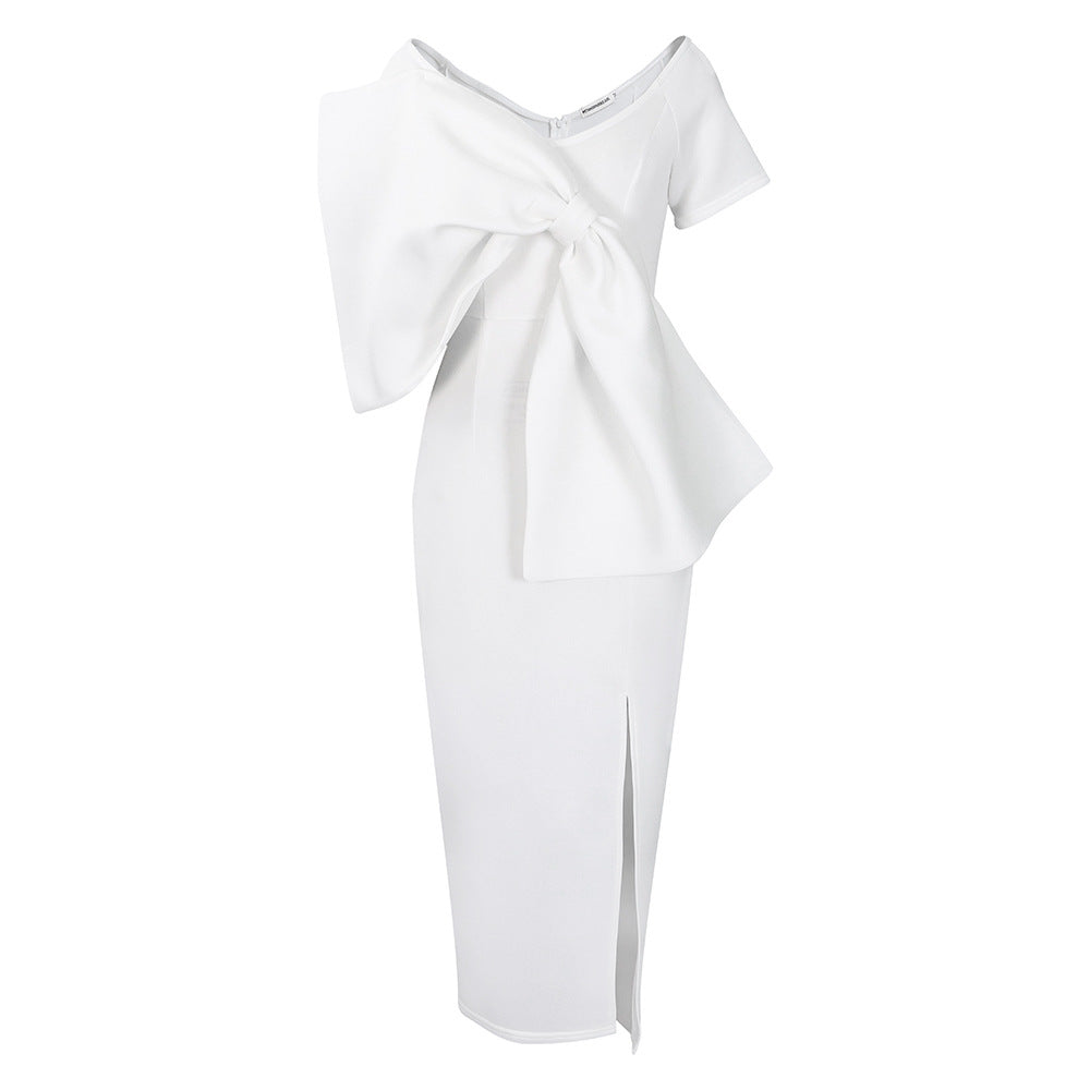 Dress With A Large Bow Slit