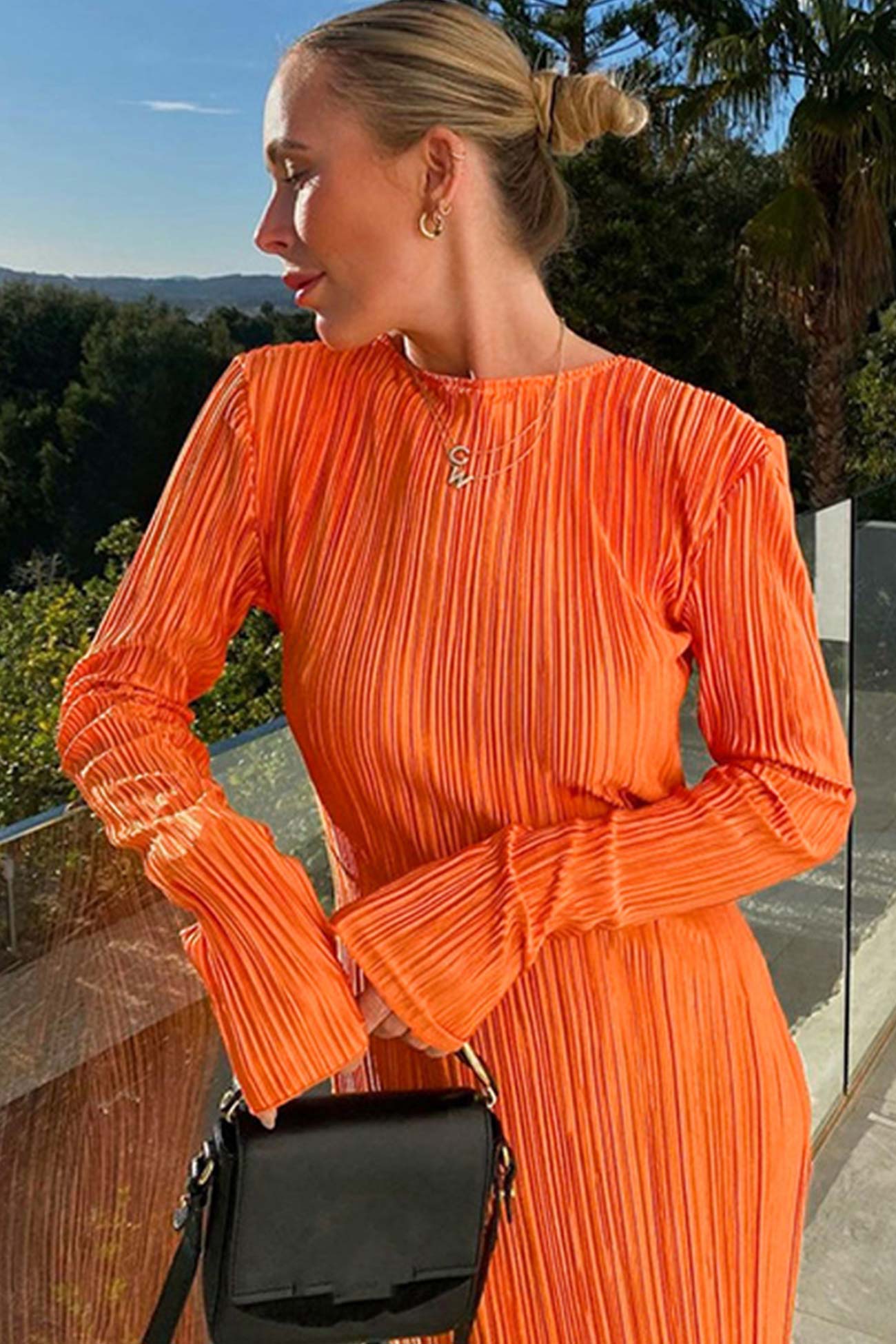 Victoria Solid Color Pleated Dress with Relaxed Fit and Layered Outfit Styling