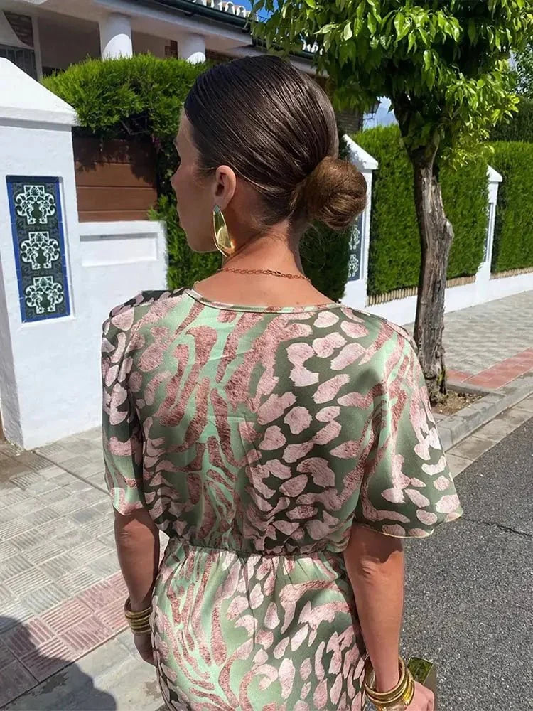 Deep V-Neck Twist Front Satin Animal Print Bodycon Midi Dress