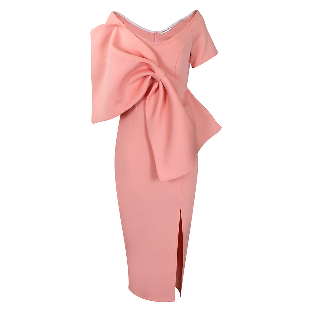 Dress With A Large Bow Slit