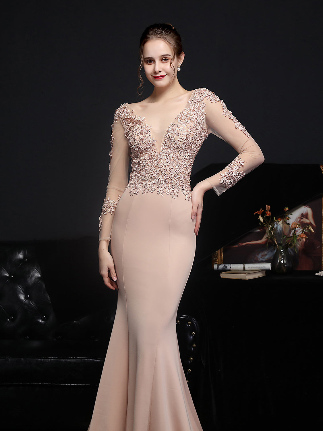 Lace long sleeved evening dress