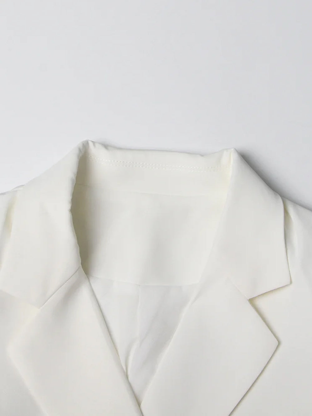 White Notch Lapel Peplum Blazer And Skirt Set